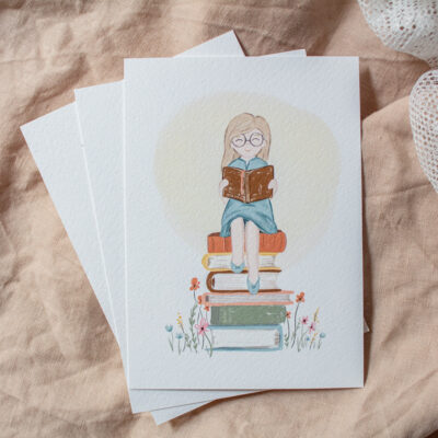 Ansichtkaart 'Meisje met boek'